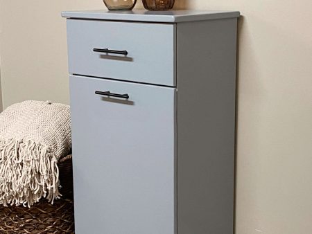 Sinclair with a storage drawer in gray modern door. Online